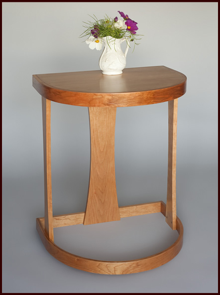 Curved wall table